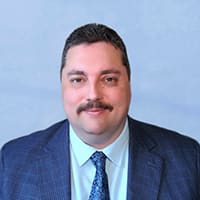 Headshot of Darrell Geusz