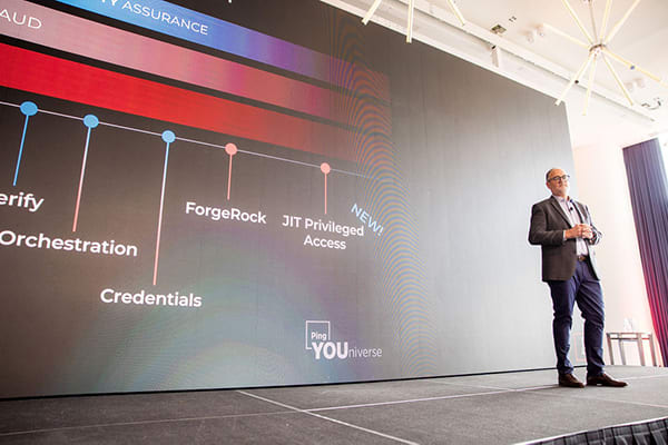 Peter Barker on stage presenting on JIT Privileged access