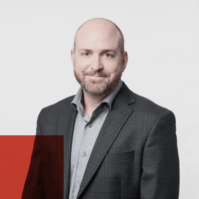 Decorative headshot of Jason Kees, Chief Information Security Officer at Ping Identity. 