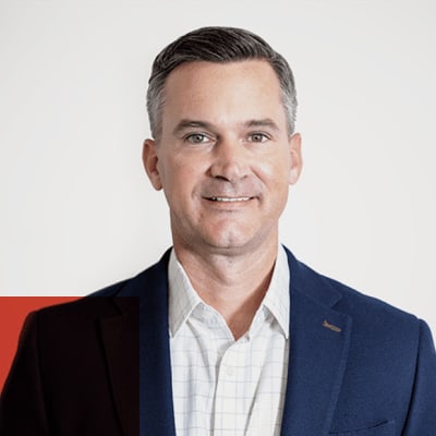 Decorative headshot of Jason Wolf, Chief Revenue Officer at Ping Identity.
