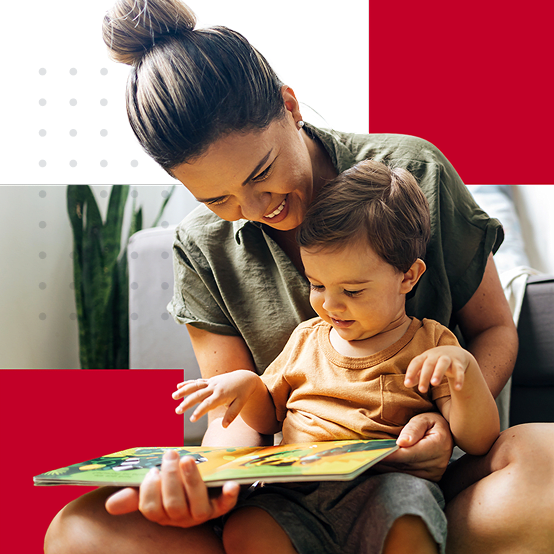 Mother and child reading a book together