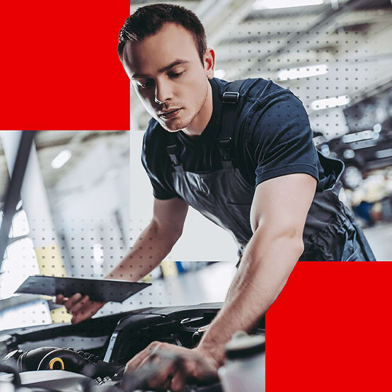 Mechanic working under the hood of a car