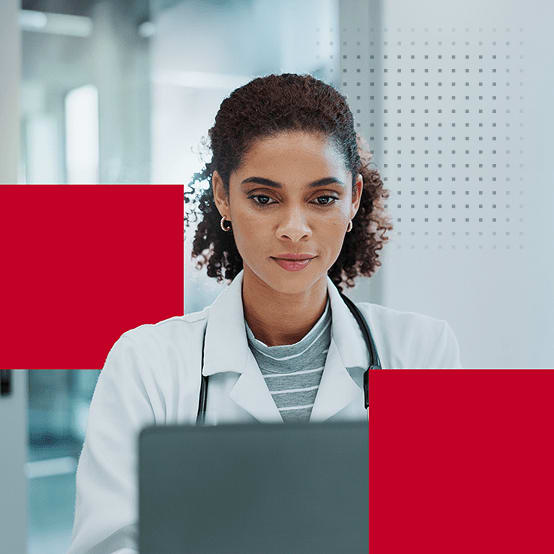 Health professional working on laptop