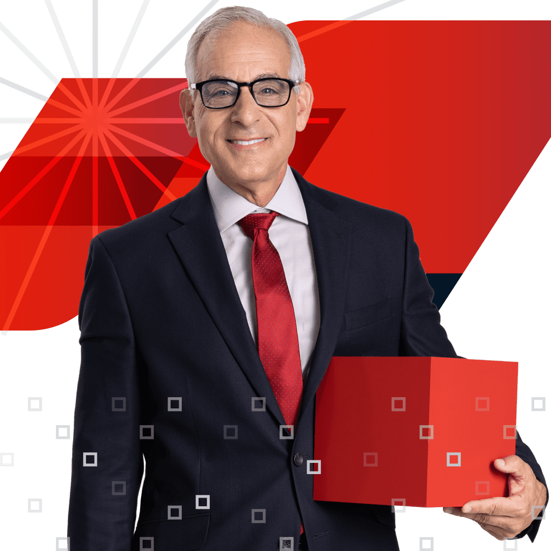 Man with glasses holding a red box