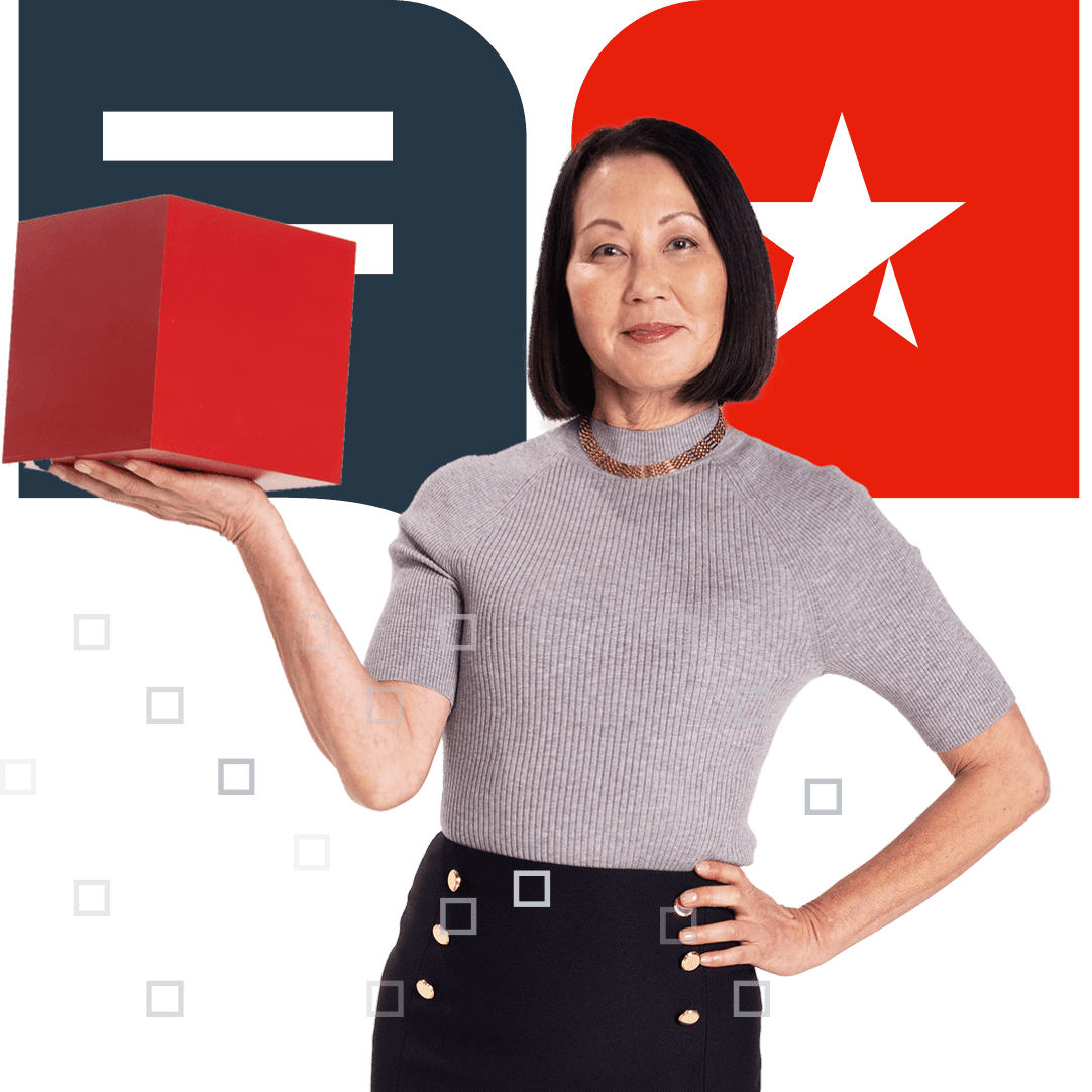 A woman holding up a red box
